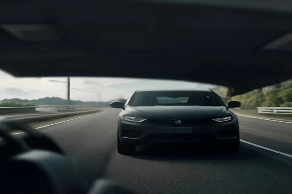 Car driving on a highway with driver-assistance systems active